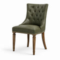 Sedia da pranzo imbottita in pelle sintetica verde con gambe in legno