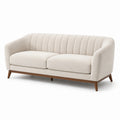 Divano in tessuto beige con struttura in legno
