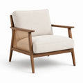Poltrona in legno con tessuto crema e schienale in rattan